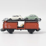 Märklin 4613 autotransport met kevers en Porsche 911DB